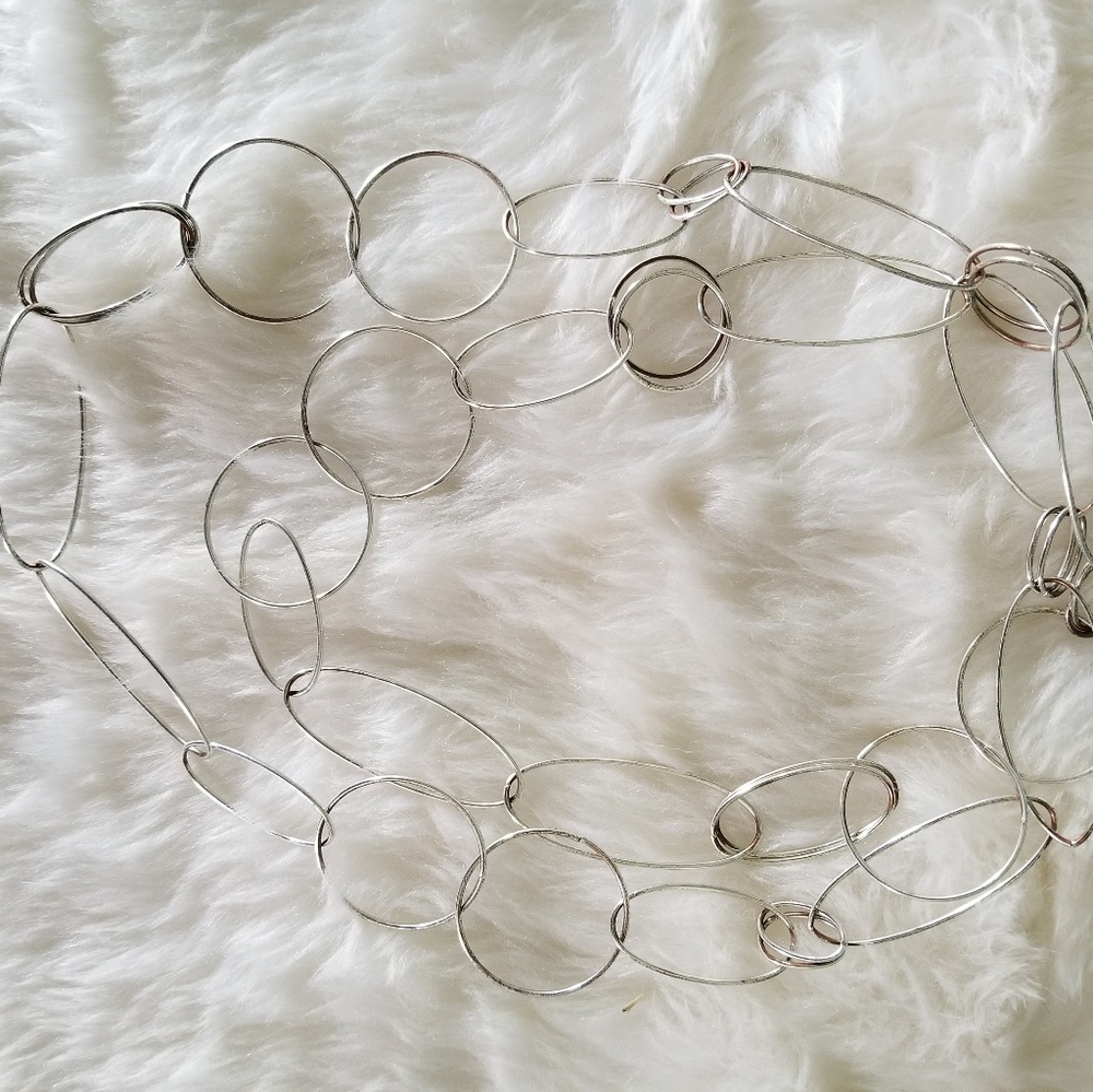 Silver infinity style necklace